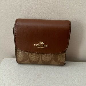 Used coach three fold wallet for women